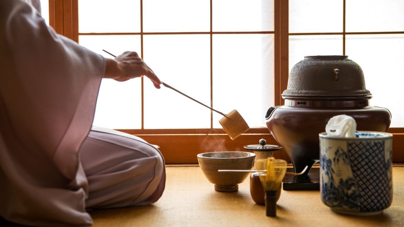 Person preparing tea